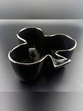 Sur La Table club-shaped, black ceramic snack bowl.